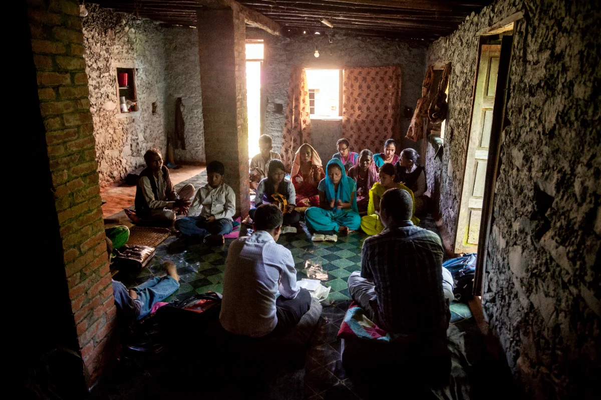 A house church meeting on the floor