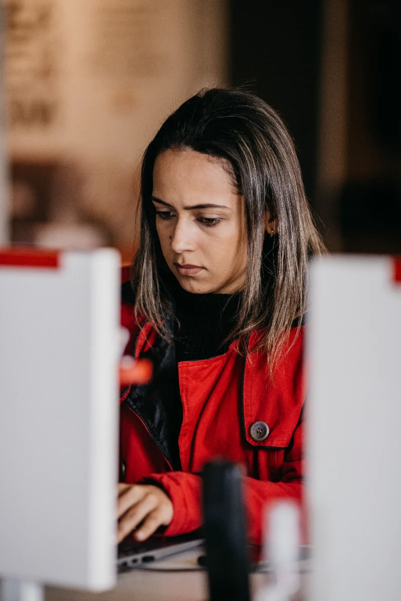 Strategist reviewing AI tools on a laptop